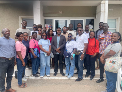 Students and IESS personnel pose for a photo on a field visit to Weija waterworks