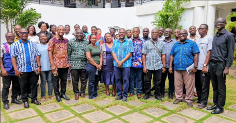 IESS Fellows and students pose with visiting professor K.D Dzigbede